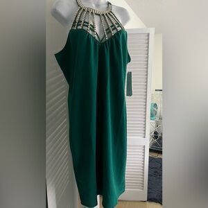 NWT Cute rhinestone halter neck dress. Pit to pit 21 inches. 💚💙💚